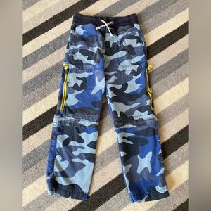Boden zip-off techo pants, size 6y, blue camo with yellow zipper accents.